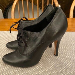 Steven by Steve Madden lace-up bootie in black leather